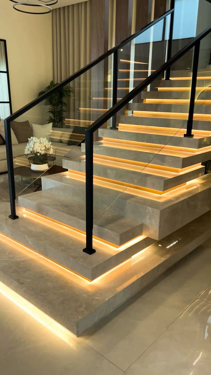 LED aydınlatmalı mermer basamaklar ve cam korkuluk